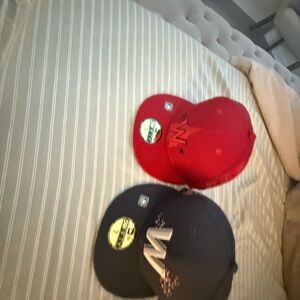 New Era Red and Black Caps